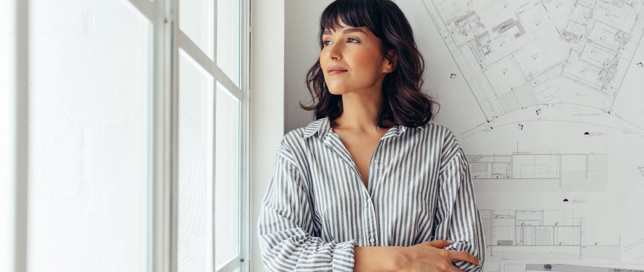 a woman looking out a window