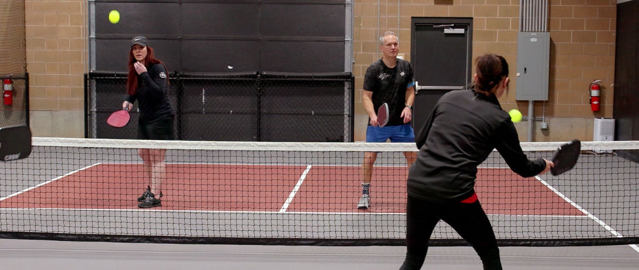 People playing Pickleball. 