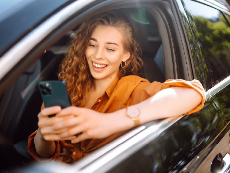 A woman in her car