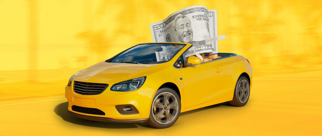 an image of a yellow convertible. 