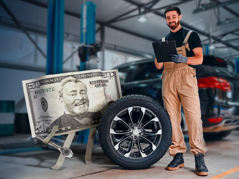 An image of a small business owner in his automotive repair garage.