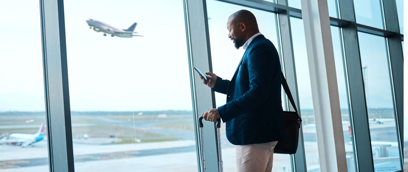 A business professional at the airport.
