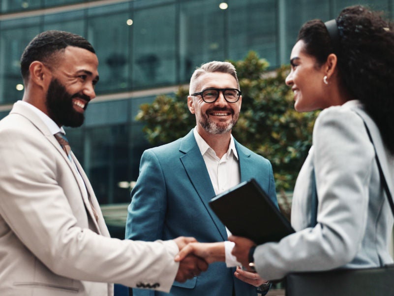 Three people in business attire