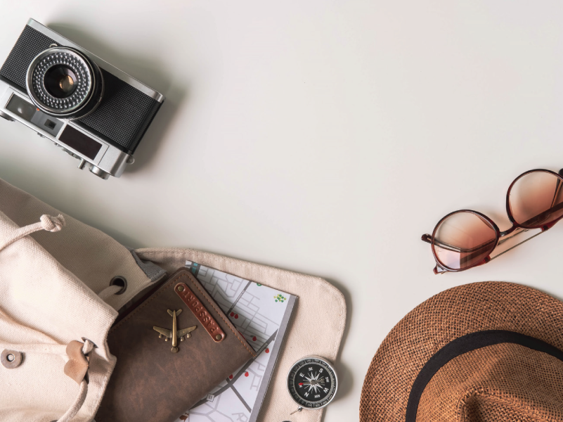 sunglasses, a hat, and a camera