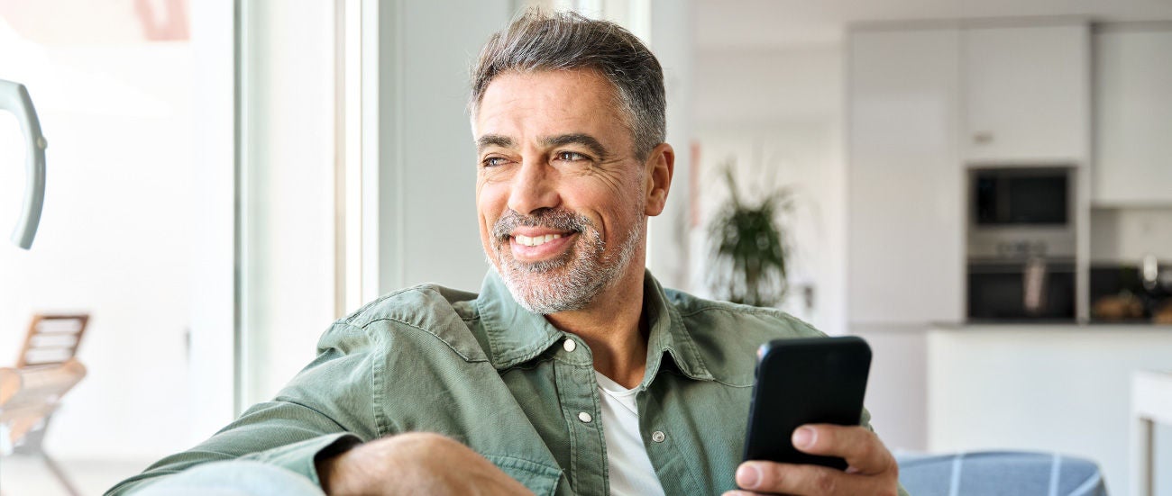 A man on his phone. 