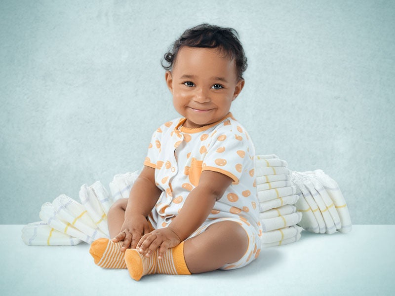 A picture of a baby smiling.