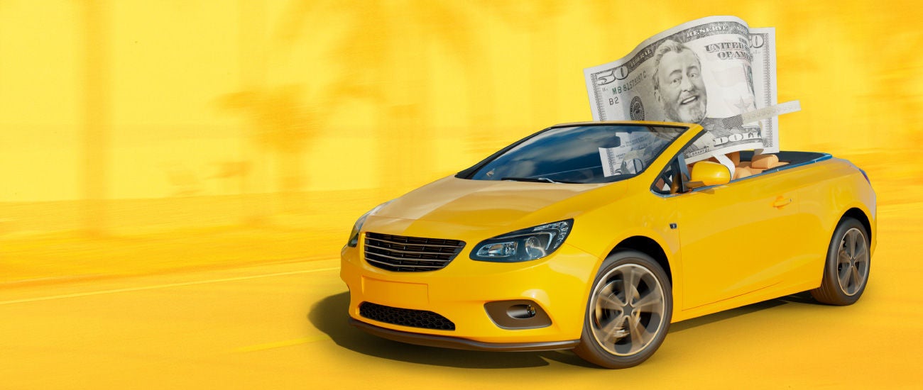 an image of a yellow convertible. 