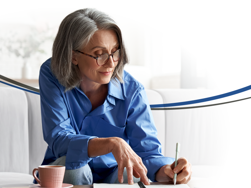 a woman writing something down