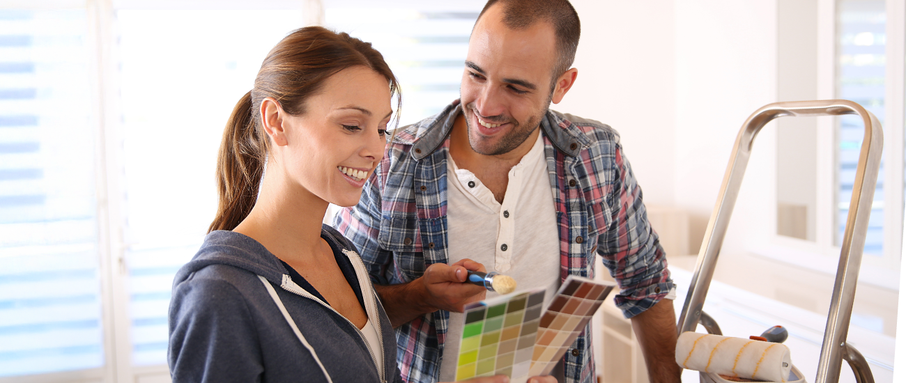 An image of a man and woman planning home rennovations. 