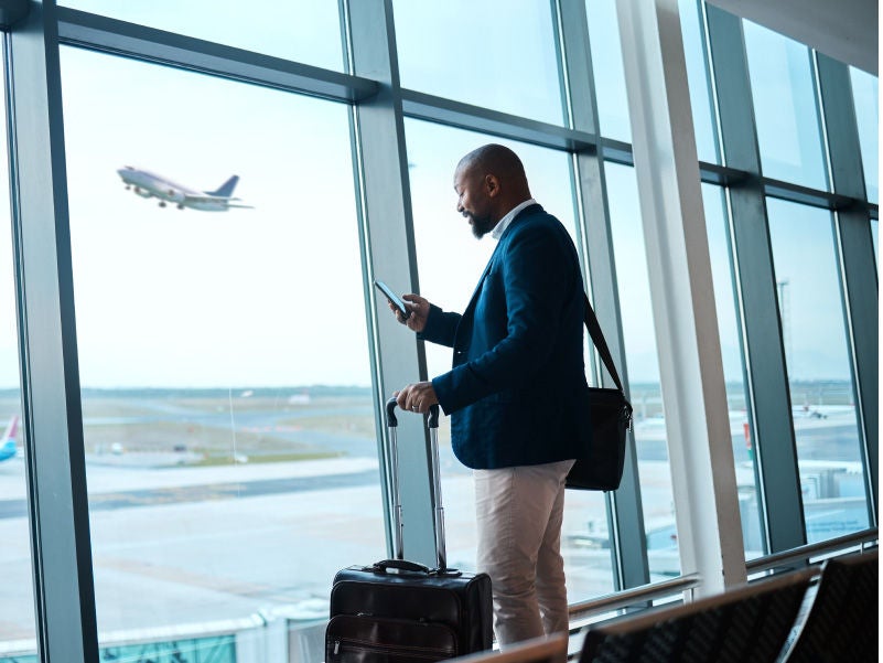 A business professional at the airport.