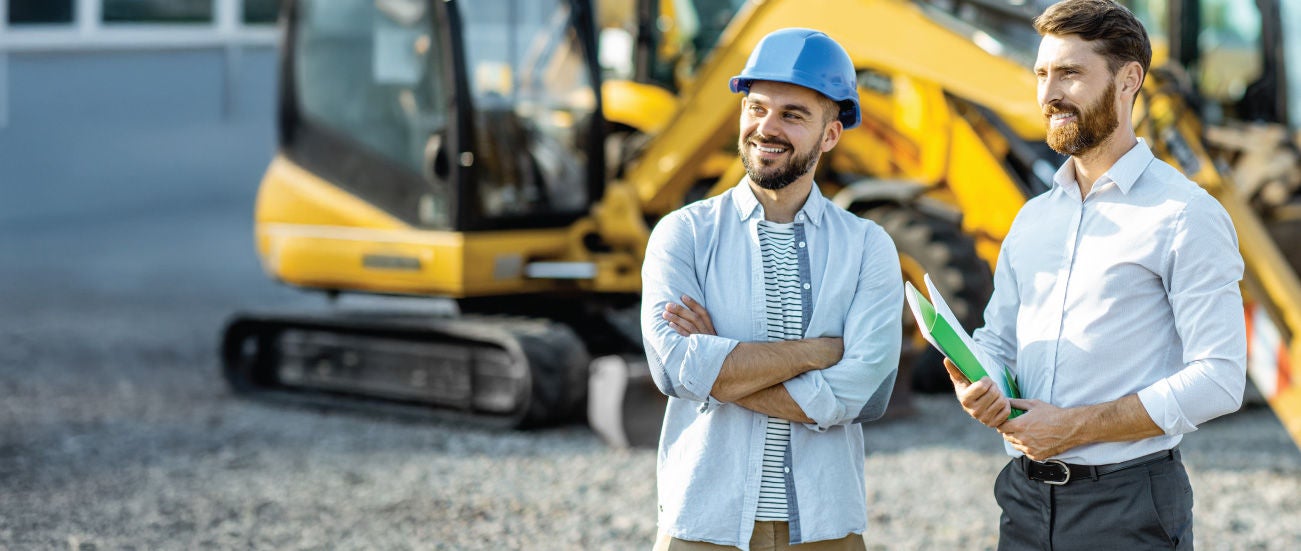 Two men at a construction site