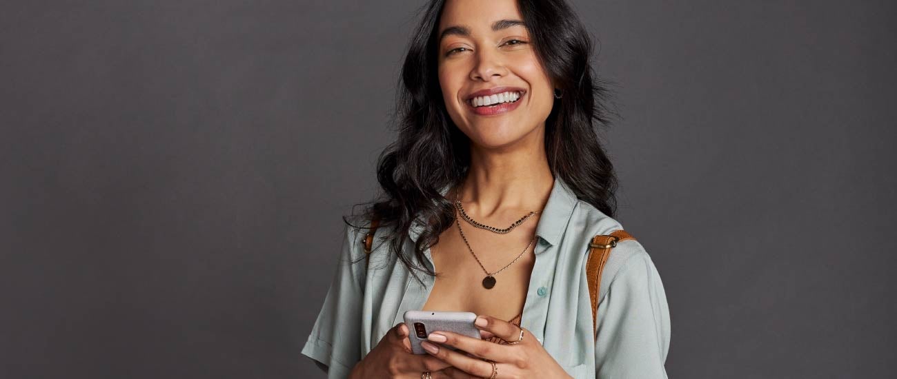 Woman with a phone in hand.