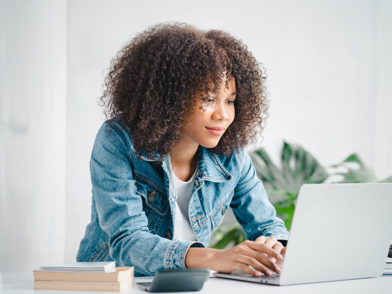 A woman using a laptop