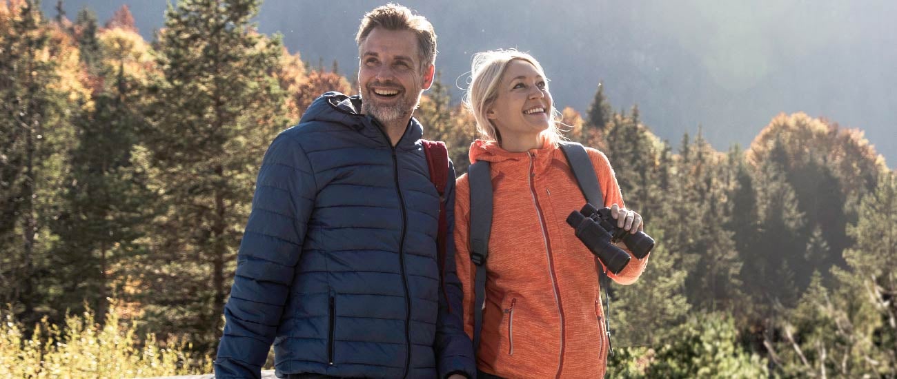 a couple hiking in the woods