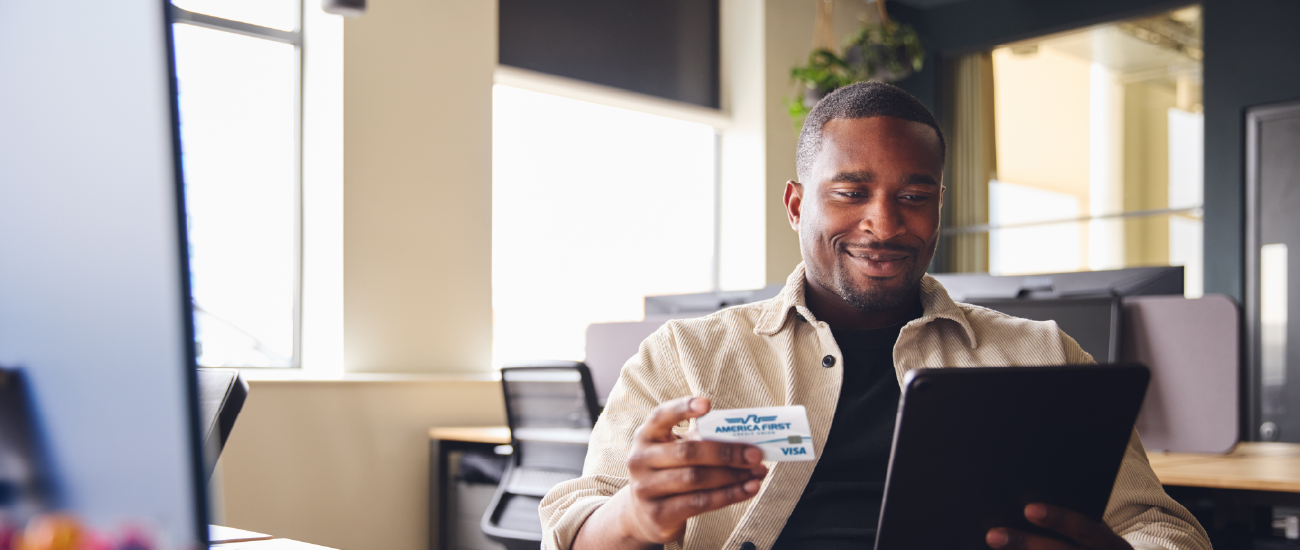 Woman holding a credit card