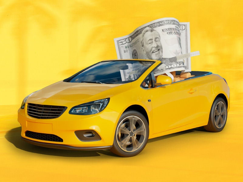 an image of a yellow convertible. 