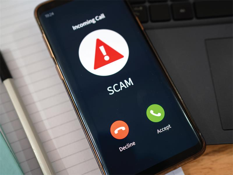 A smartphone receiving a scam call. 