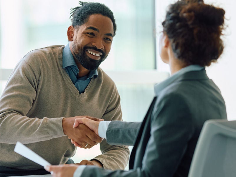 Two people shaking hands