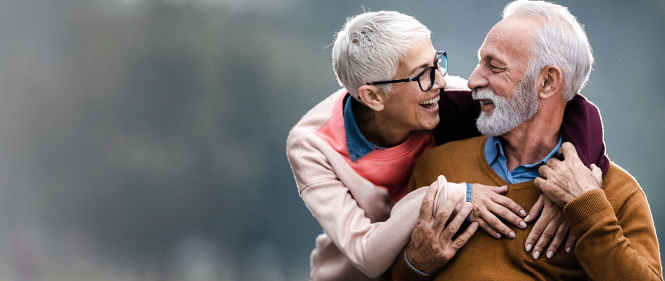 an elderly couple in the park