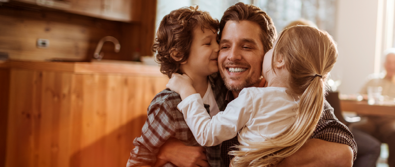 A man with two children