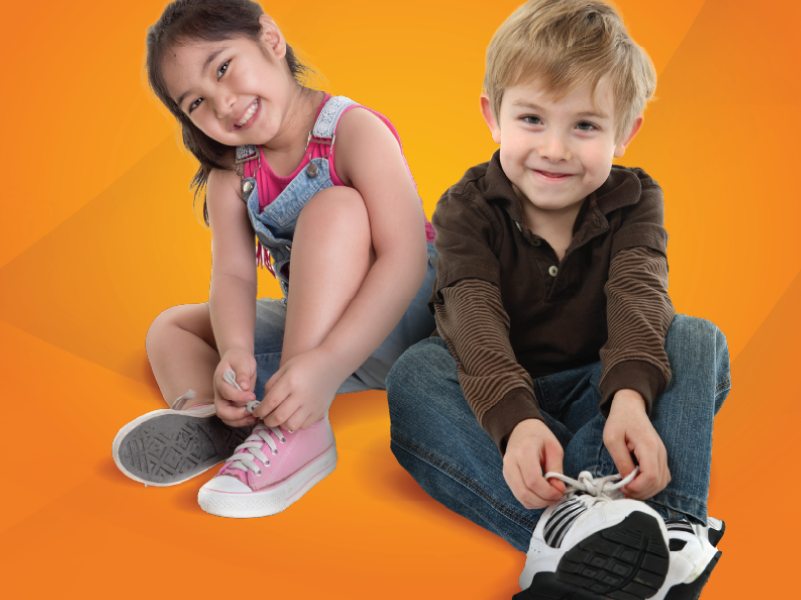 children putting on shoes